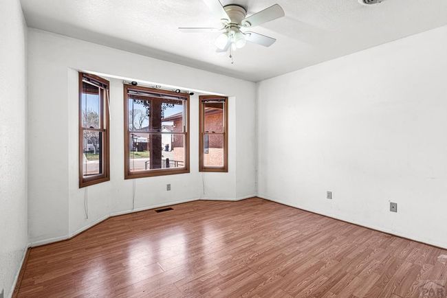3rd bedroom, bay windows, nice flooring, ceiling f | Image 19