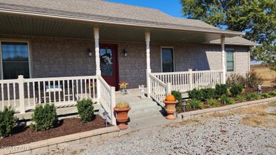 Autumn is here-front porch decorated for Fall. | Image 2