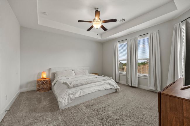 Master suite features master bedroom with tiered ceiling | Image 20