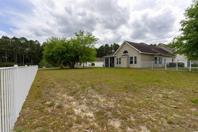 View of yard with a fenced backyard | Image 28