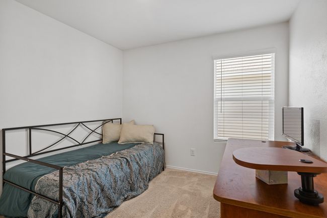 Carpeted bedroom with baseboards | Image 17