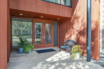 Enter the home through the double doors to a large foyer that is private from the main living areas of the home. | Image 3