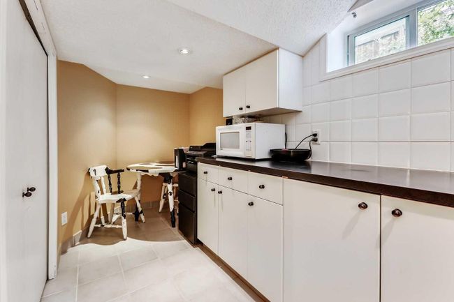 409 12 Avenue Nw, Home with 2 bedrooms, 1 bathrooms and 2 parking in Calgary AB | Image 23