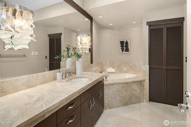 Across the way, the bathroom with waterfall-like glass sconces. | Image 20