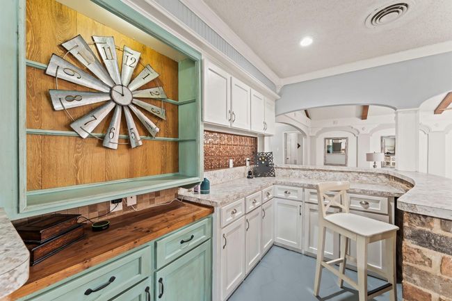 Built-in wet bar is a great feature for hosting. | Image 11