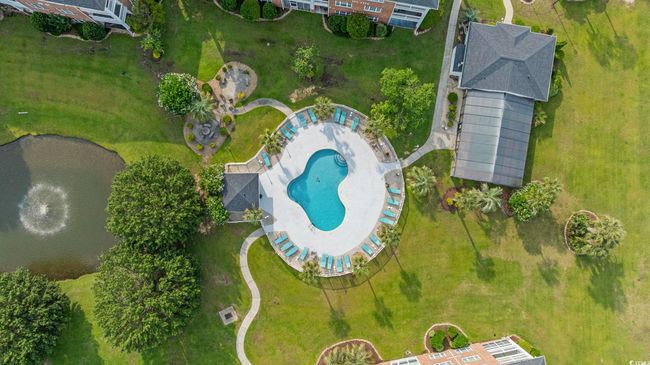 View of property location with a pool area | Image 26