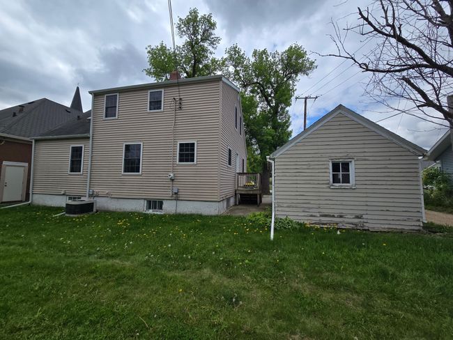 Back of house & garage-shows deck between house & garage | Image 37