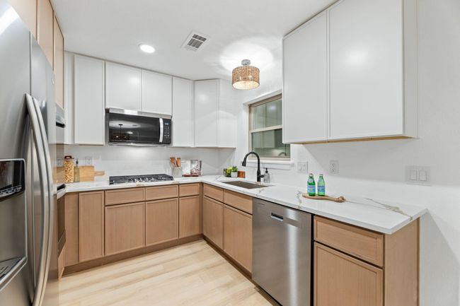 Stainless steel fridge, double oven, built in microwave and new dishwasher are all included. | Image 7