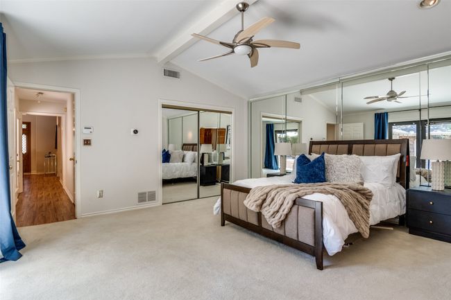 Bedroom with carpet floors, a closet, and ceiling fan | Image 20