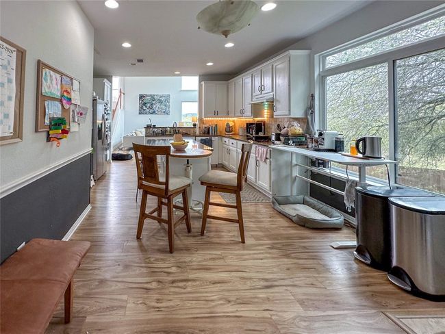 Dining room featuring recessed lighting and light wood-style flooring | Image 13