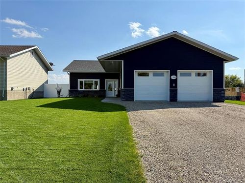 1205 3 Rd St S, House with 2 bedrooms, 2 bathrooms and null parking in Swan River MB | Card Image