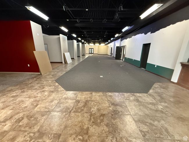 Interior space with baseboards | Image 10