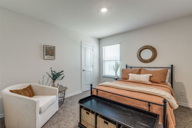 Bedroom 3 featuring carpet floors and nice sized reach in closet. | Image 20