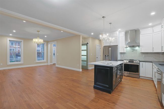 Flow of open plan living allows for warm and welcoming entertaining. | Image 16