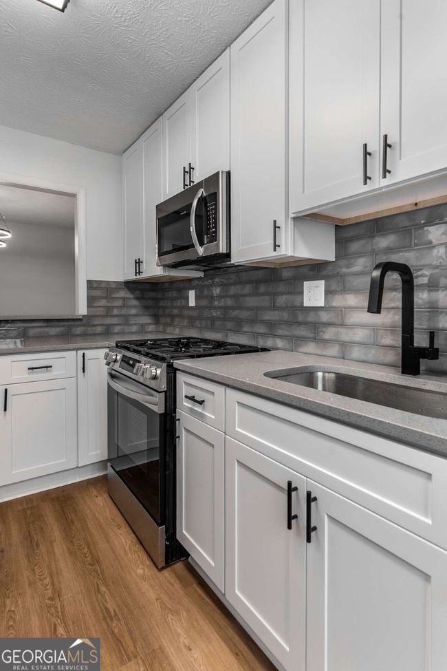 1003 Cumberland Ct Se, Condo with 2 bedrooms, 1 bathrooms and 2 parking in Smyrna GA | Image 16