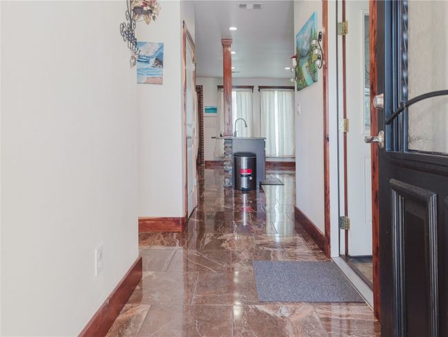 Hallway featuring marble tiled flooring and recessed lighting | Image 8