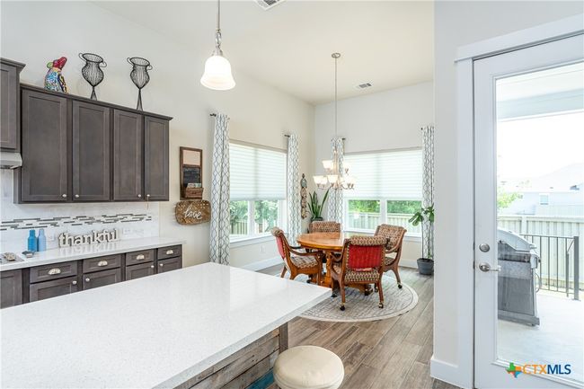 Kitchen toward dining room. | Image 14