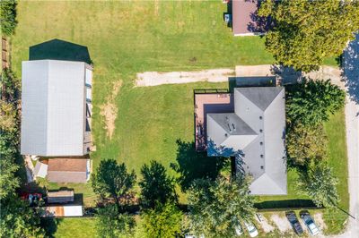 aerial view with 2000 sq ft home in the front with 2400 sq ft shop in the back | Image 3