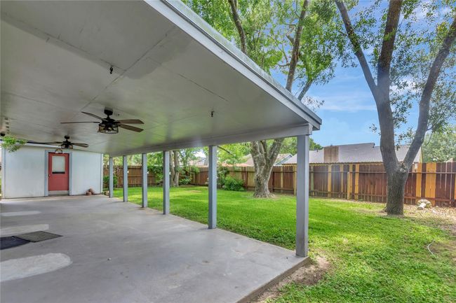 Backyard with covered patio | Image 17