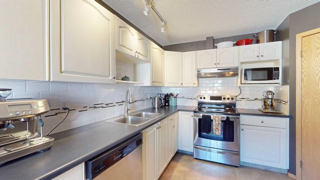 2 - 6408 Bowwood Drive Nw, Home with 2 bedrooms, 1 bathrooms and 1 parking in Calgary AB | Image 12