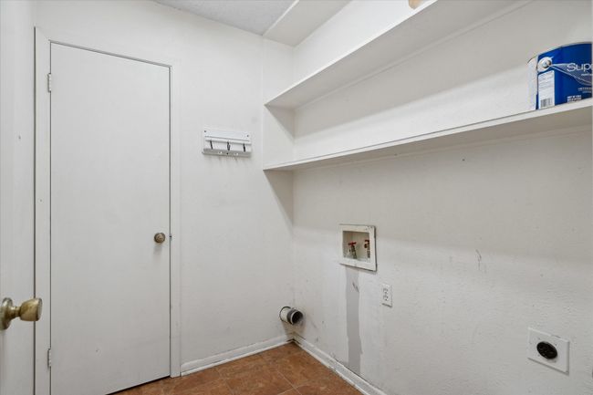 Laundry area with hookup for an electric dryer and washer hookup | Image 19