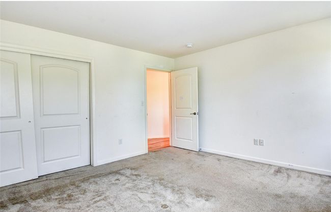 Featuring carpet floors and a closet | Image 20