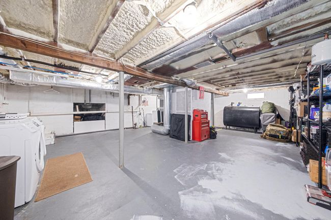 Below grade area with heating fuel and washer and clothes dryer | Image 37