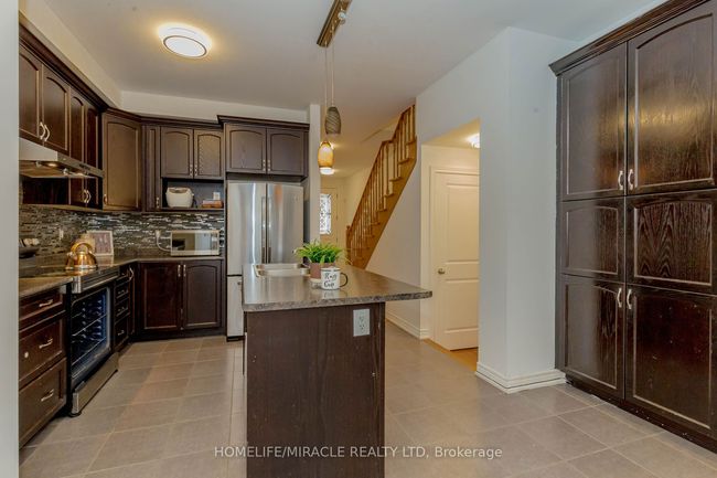 9 Dufay Rd, House attached with 4 bedrooms, 4 bathrooms and 3 parking in Brampton ON | Image 6