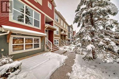 10 Auburn Bay Ave Se, Townhouse with 2 bedrooms, 3 bathrooms and 4 parking in Calgary AB | Image 1