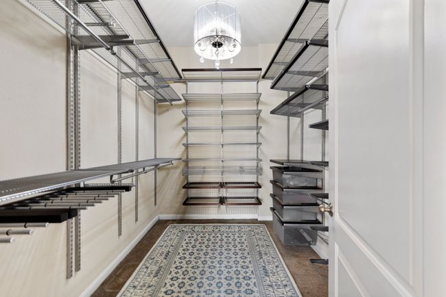 Primary closet decked out with Elfa Closet system | Image 24