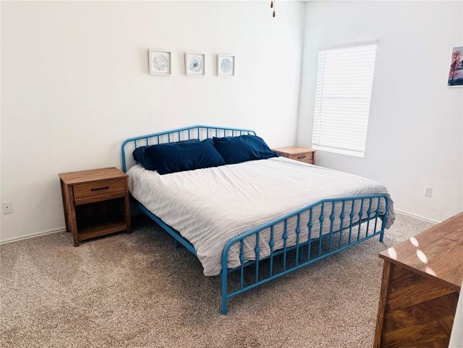 Large primary bedroom has walk in closet | Image 13