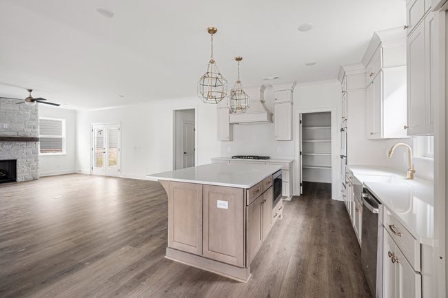 Open kitchen so you can chat while preparing snacks and meals | Image 5