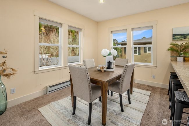 The dining room is a welcoming space that sets the stage for shared meals and memorable gatherings. | Image 10