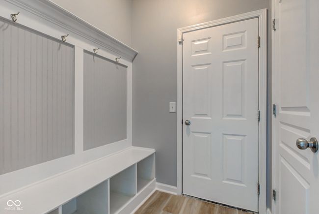 mudroom with wood finished floors and baseboards | Image 20
