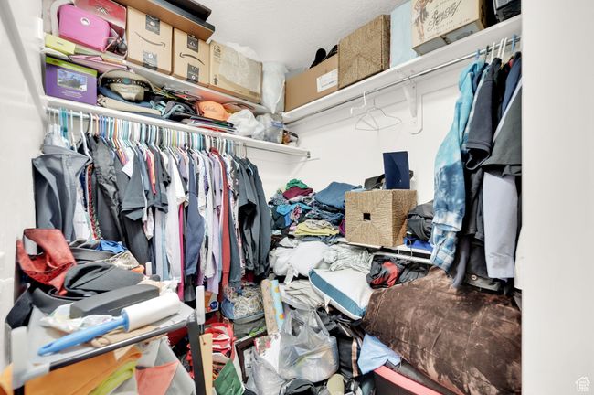View of spacious closet | Image 9