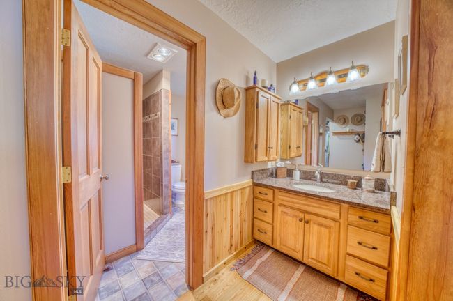 Primary ensuite bathroom with walk-in tiled shower | Image 18