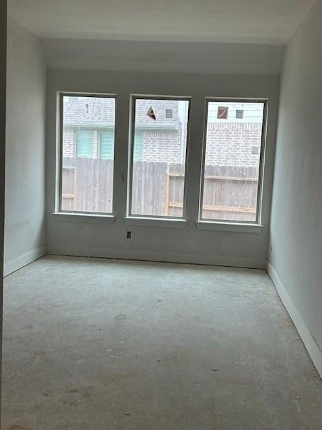 Dining room offers plenty of natural light. | Image 4