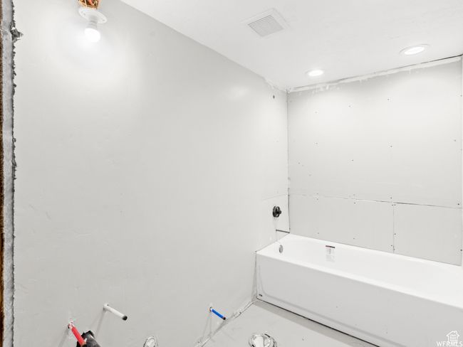 Full bathroom with a bath and recessed lighting | Image 19