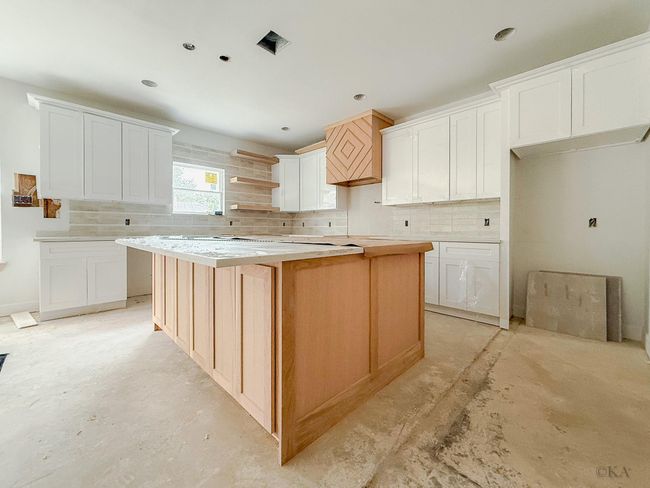 Custom designed kitchen with modern two-tone white oak cabinets and white shaker cabinets. | Image 8