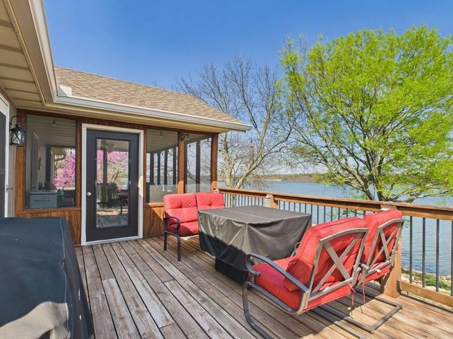 Wooden deck with a water view | Image 13