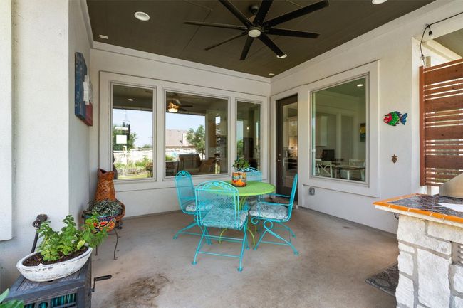 View of patio with ceiling fan | Image 30