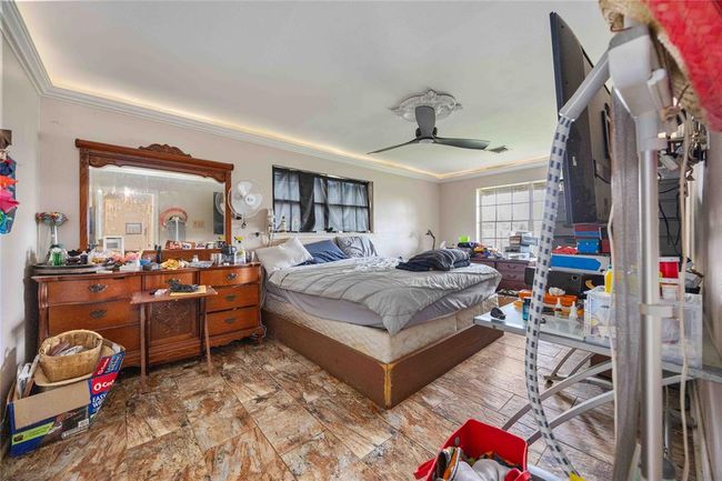 The primary offers a walk in closet and in suite full bath. | Image 13