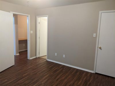 Spare room with dark wood-type flooring | Image 3