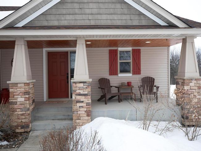 Sit and relax under the covered porch after a long day at work | Image 13