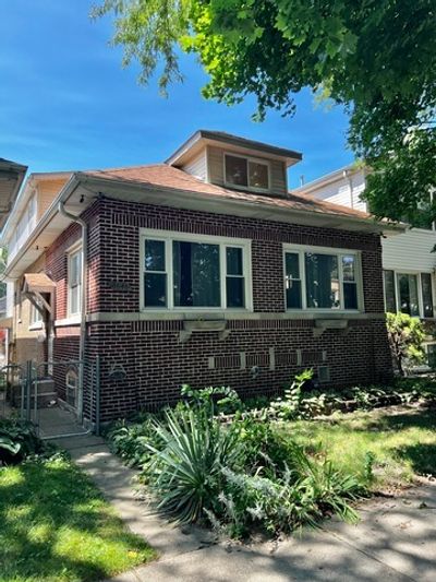 5648 N Moody Avenue, House other with 4 bedrooms, 3 bathrooms and 2 parking in Chicago IL | Image 1