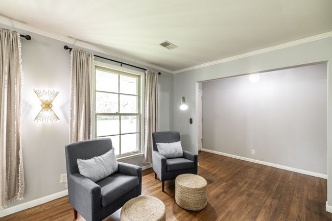 To the right you'll find a large flex room. | Image 17