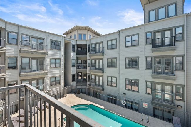 Balcony featuring view of pool | Image 22