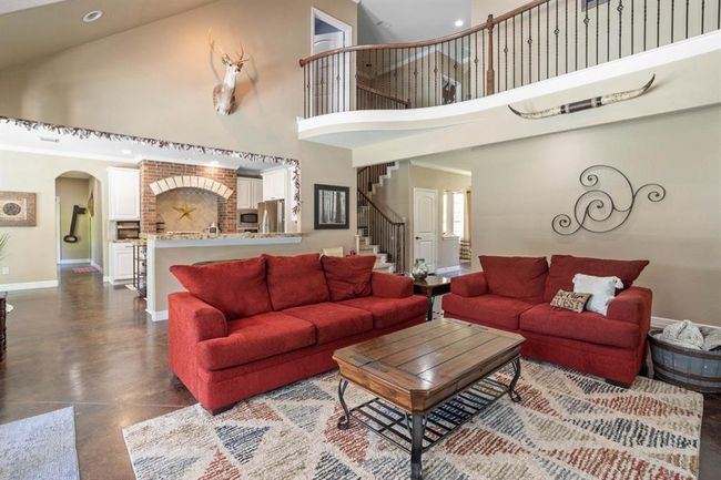 Living room and open kitchen allow the conversation to continue | Image 13