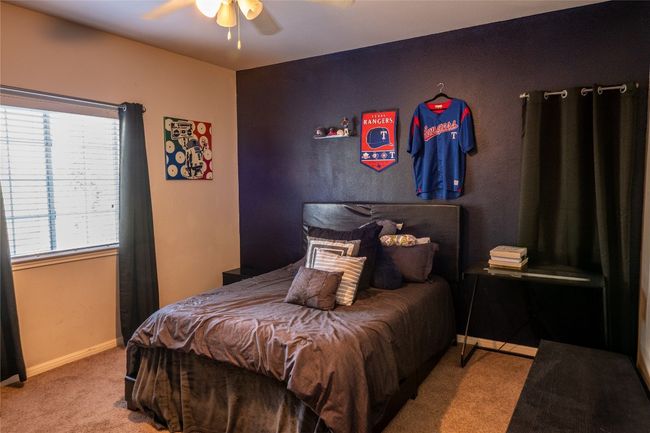 Carpeted bedroom featuring baseboards and ceiling fan | Image 15