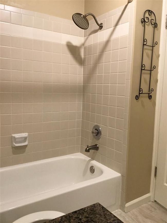 Rain shower head is in both bathrooms. | Image 34